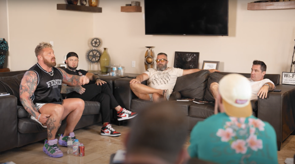 A group of men engaging in a deep discussion at an Uncaged Men’s Accountability Group retreat, focused on rebuilding trust, extreme ownership, and personal accountability.